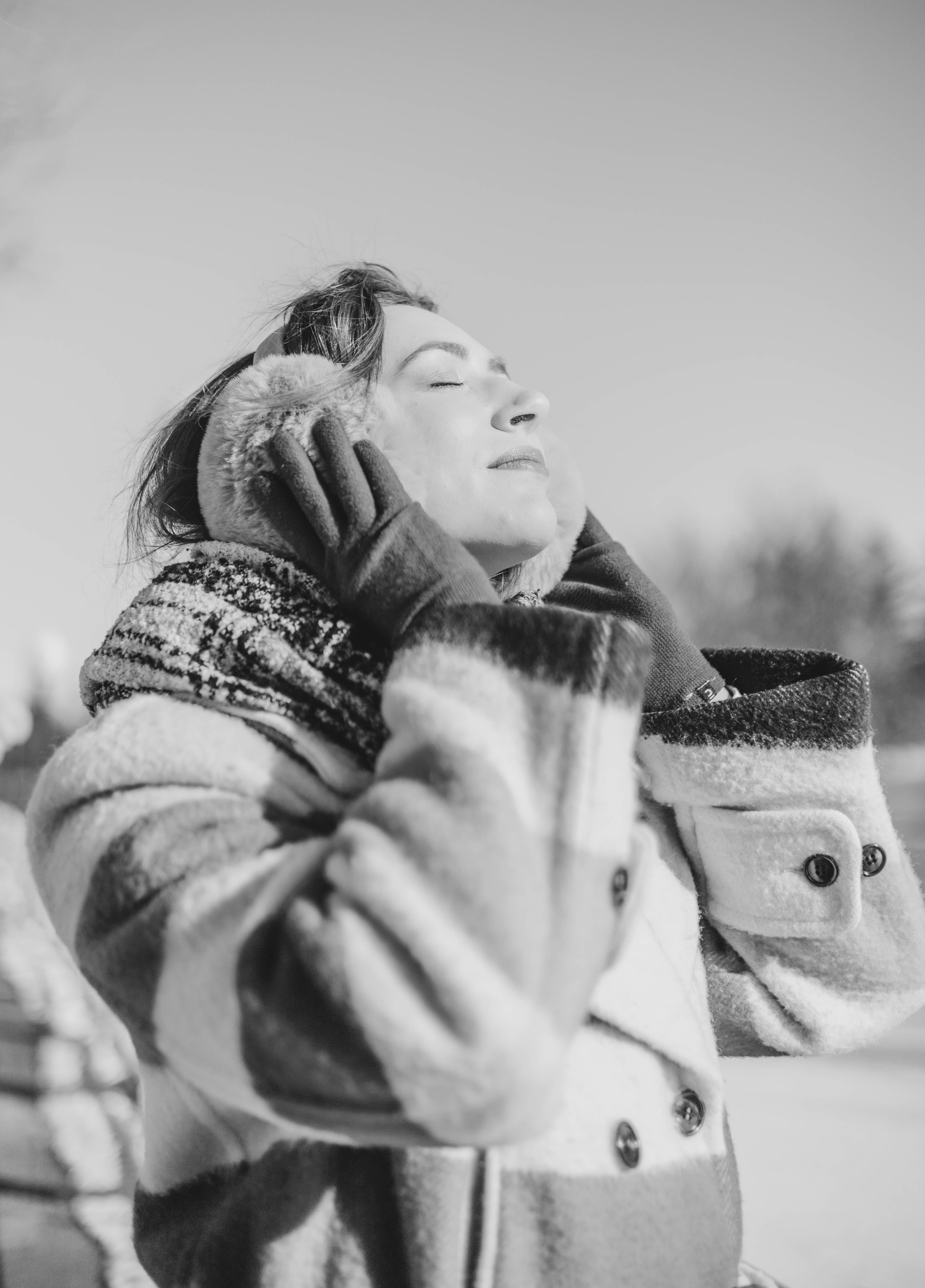 Black and white portrait in winter coat